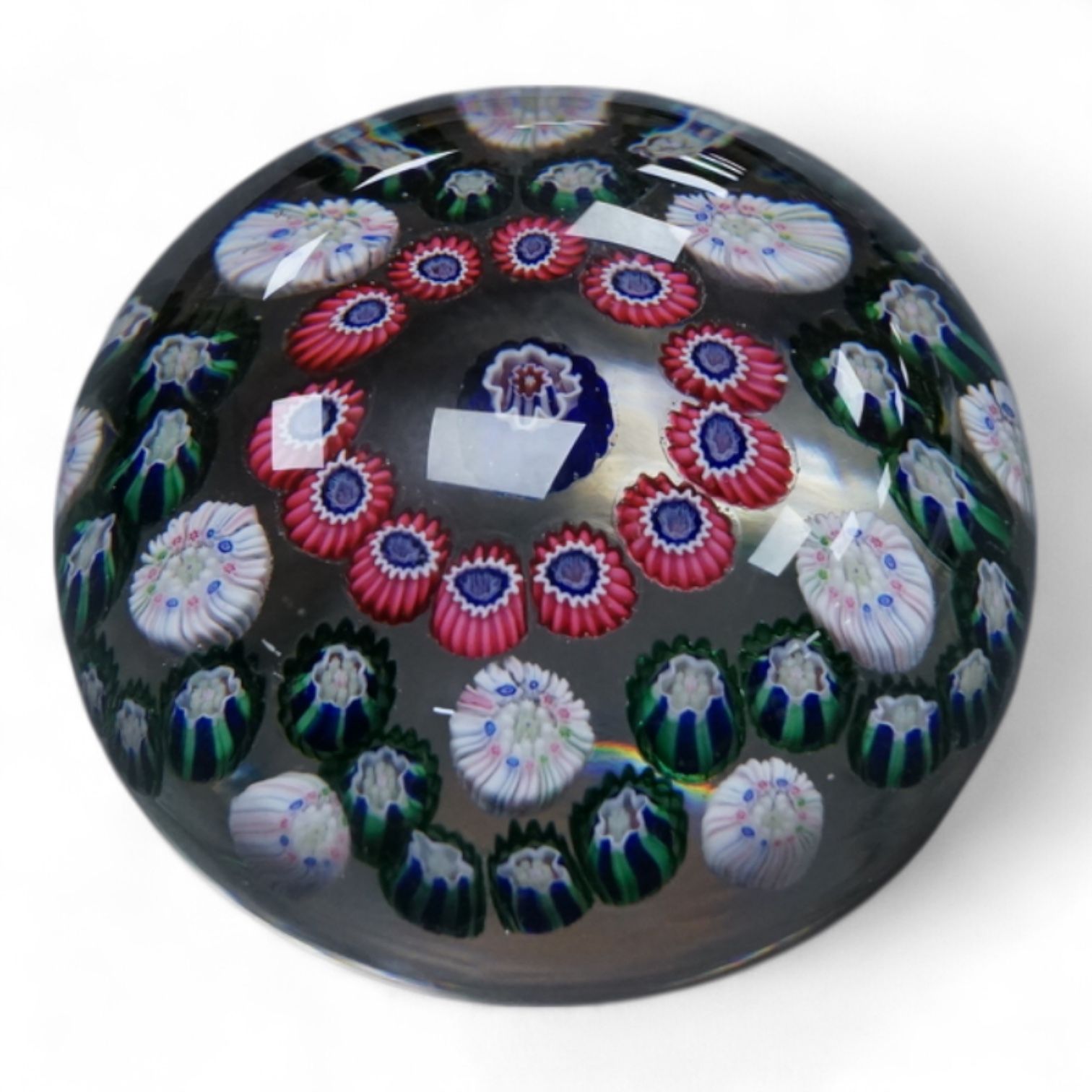 A Clichy glass garland paperweight, 7cm diameter.